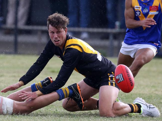 Michael Riseley competes for the ball for Woori Yallock this year. Picture: Stuart Milligan