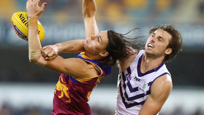 Eric Hipwood battled hard against Fremantle’s Joel Hamling. Picture: Getty Images