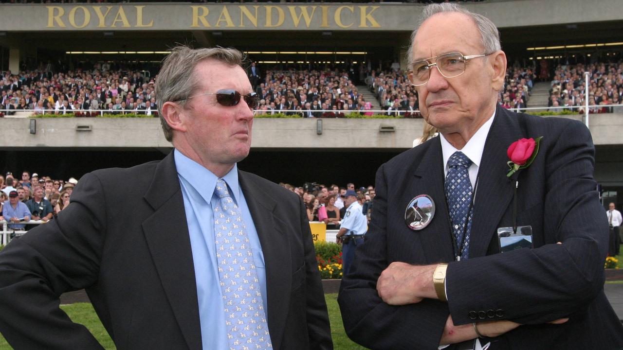 Racehorse trainer John Hawkes (l) with owner of racehorse Lonhro, Bob Ingham at Randwick 17 Apr 2004.