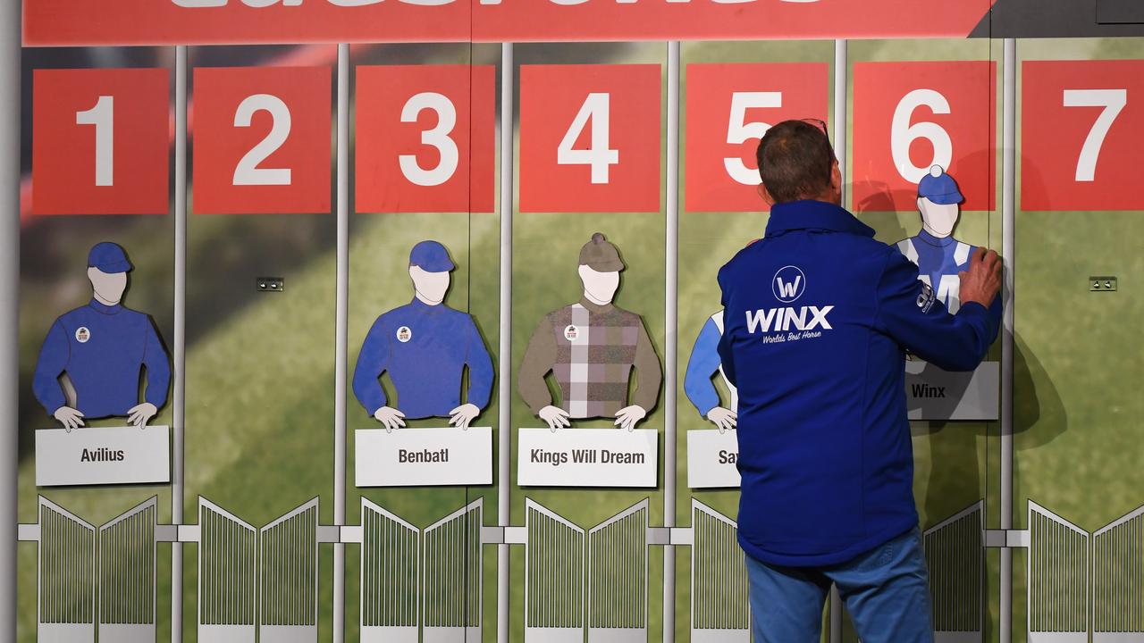 MELBOURNE, AUSTRALIA - OCTOBER 23:  Part owner of Winx, Peter Tighe selects barrier six for Winx at the Cox Plate barrier draw after Breakfast with the Best at Moonee Valley Racecourse on October 23, 2018 in Melbourne, Australia.  (Photo by Vince Caligiuri/Getty Images)