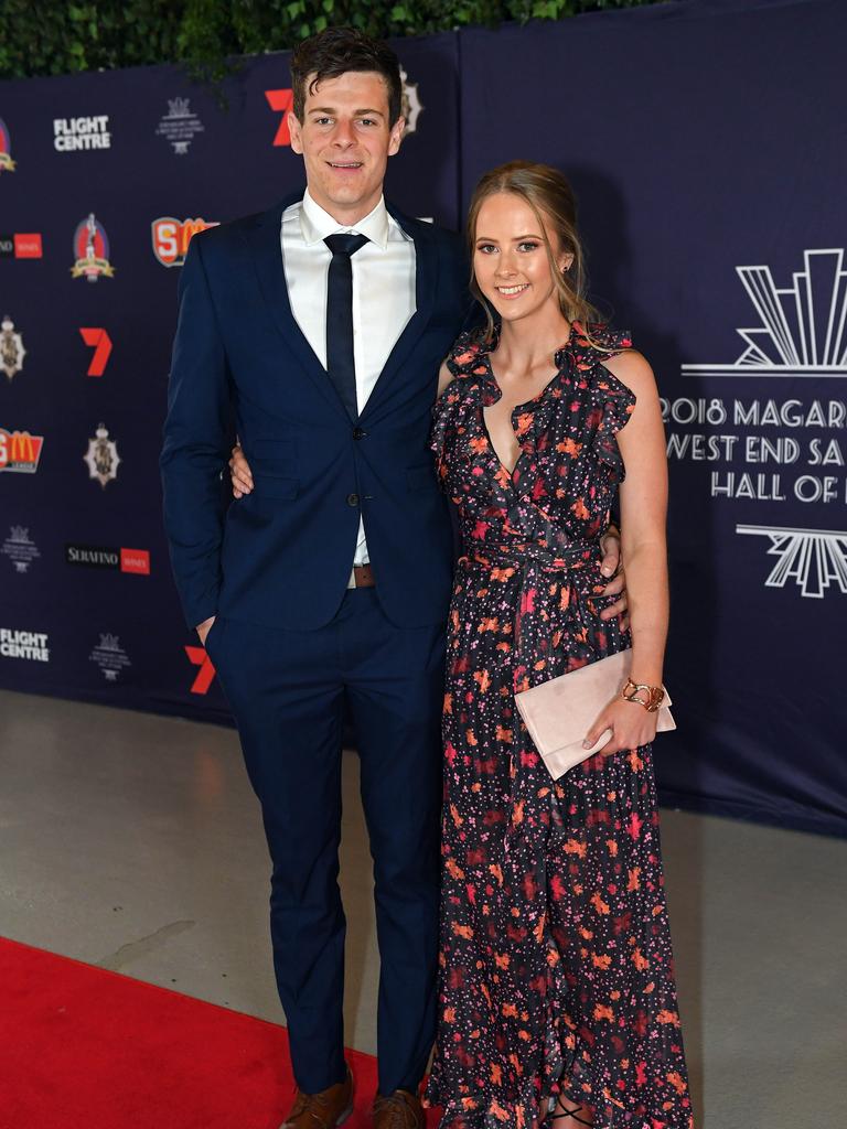 Chris Burgess and Nicci Johnson-Schreoeder on the red carpet ahead of the Magarey Medal presentation at Adelaide Oval.