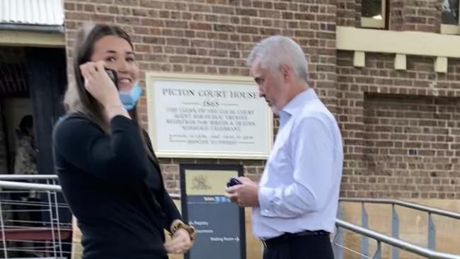 Teenager Ella Florence Mason outside Picton Local Court with a man who supported her. Picture: Adelaide Lang