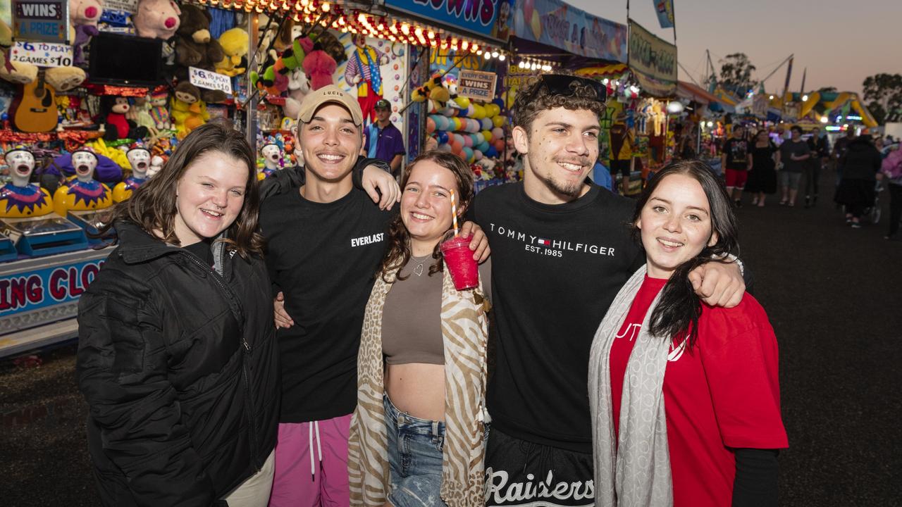 Having fun in sideshow alley are (from left) Molly Tanis, Daniel Turnbull, Chelsea Harding, Cooper Williams and Charlize Wheildon at the Toowoomba Royal Show, Thursday, March 30, 2023. Picture: Kevin Farmer