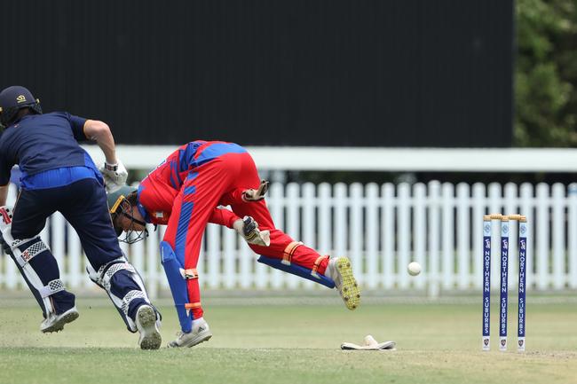 Attempted run out in the match between Northern Suburbs and Toombul Under 17 cricket at Ian Healy Oval on Sunday. Picture Lachie Millard