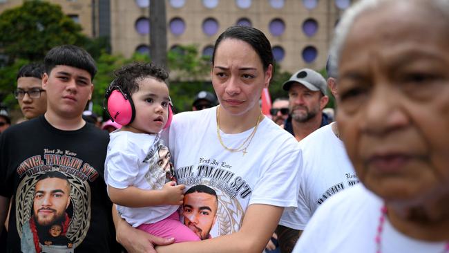 The family of deceased Cross River Rail Worker Daniel Sa’•u, his wife Geraldine and daughters Clover and Thira, taking part in a CFMEU• union rally in Brisbane. Picture: Dan Peled / NCA NewsWire