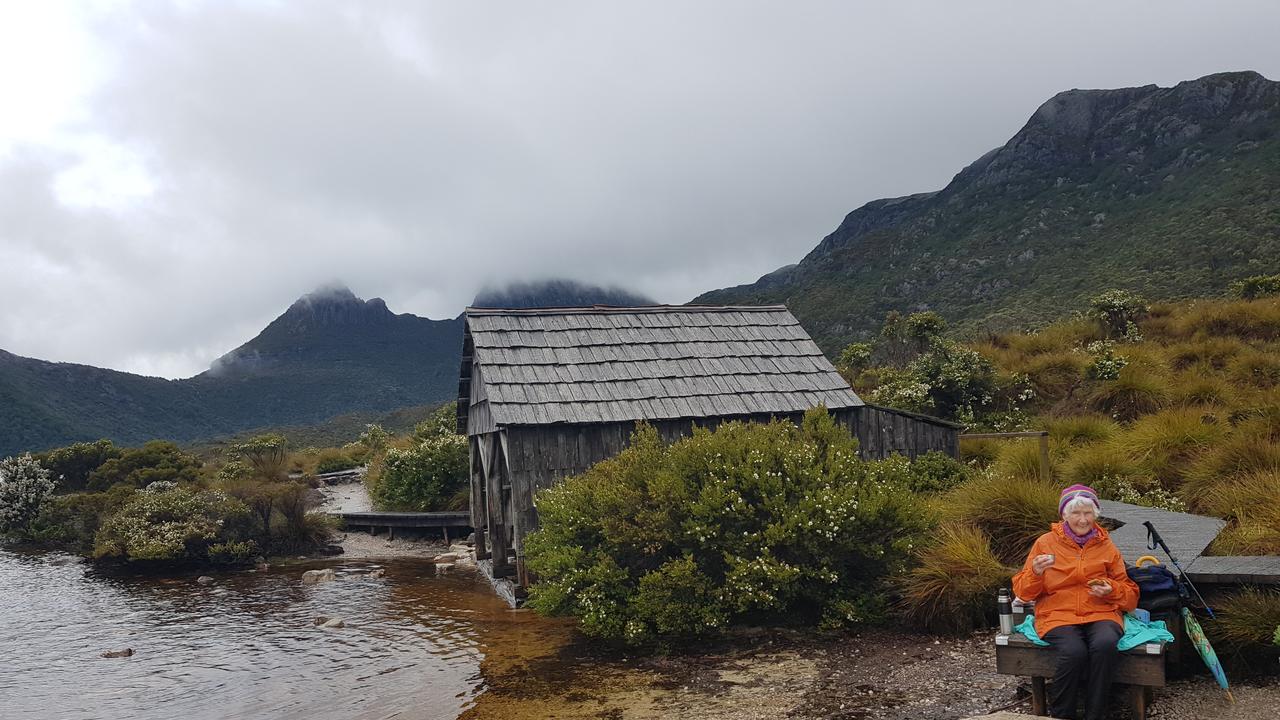 At the age of 96 Helen revisited Tasmania, travelling to Cradle Mountain and relaxing at Dove Lake. Photo: Contributed