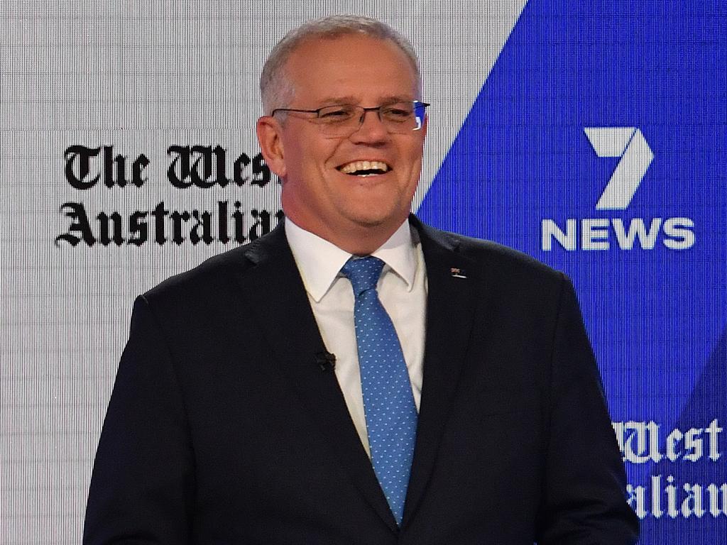 Australian Prime Minister Scott Morrison’s ‘dominance smile’ was on display on Wednesday night, according to a body language expert. Picture: Mick Tsikas/AAP