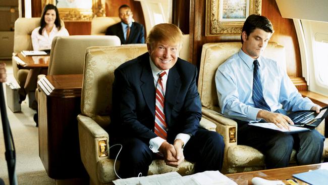 Trump, aboard his private jet in a 2004 advertisement for Holeproof Computer Socks. Picture: Supplied