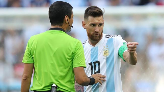 A-League referee Alireza Faghani speaks with Argentina’s Lionel Messi during the 2018 FIFA World Cup Russia round of 16 match against France at Kazan Arena in 2018. (Photo by Alexander Hassenstein/Getty Images)