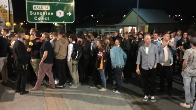 Long queues form in Caxton Street waiting for ID scanning after a Broncos match at nearby Suncorp Stadium.