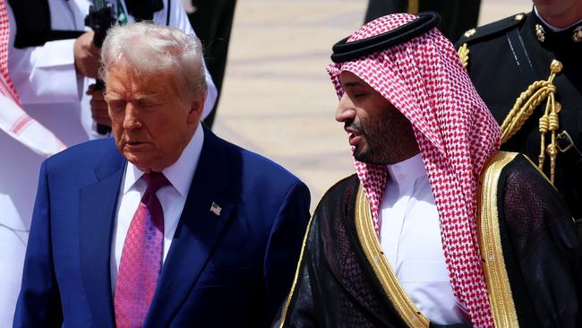 US President Donald Trump is greeted by Saudi Crown Prince Mohammed bin Salman as he arrives in Riyadh on Tuesday. Picture: Getty Images