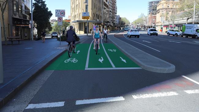 Renders of the permanent Oxford St cyclepath, which would replace the Moore Park pop-up.