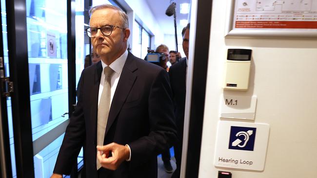 The smile on Anthony Albanese’s face when he arrived was replaced with a stern look as he headed back to his car. Picture: Toby Zerna