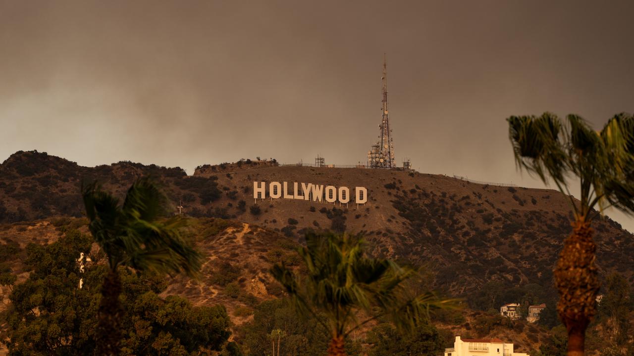 The Hollywood sign is seen with smoke from multiple wildfires on January 8, 2025. Picture: AaronP/Bauer-Griffin/GC Images