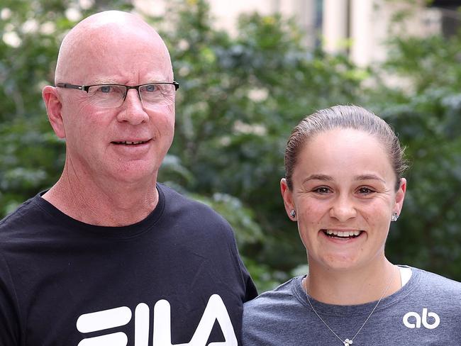 Ash Barty with her coach Craig Tyzzer during her retirement press conference, Brisbane. Picture: Liam Kidston.