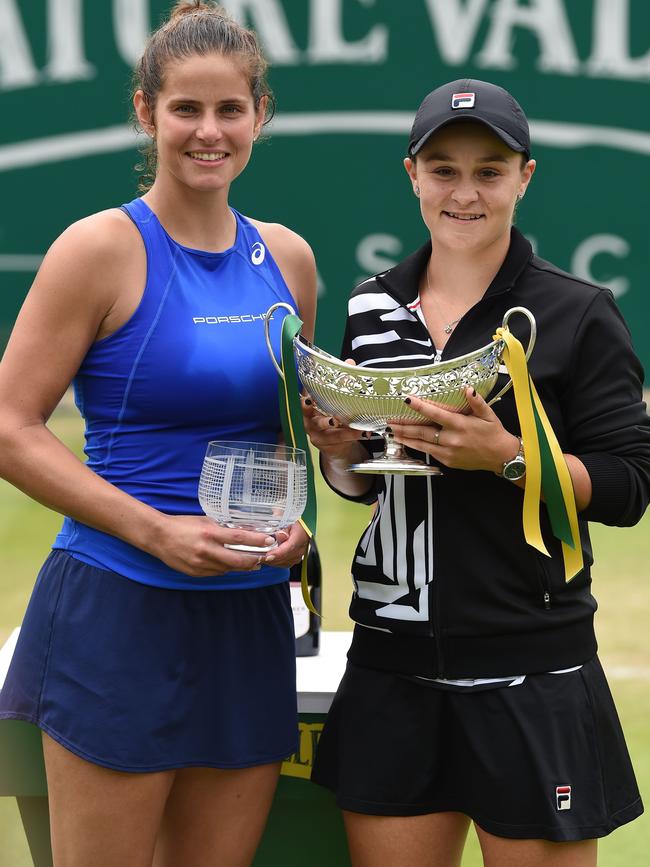 Runner-up Julia Goerges and winner Ashleigh Barty with their Birmingham trophies. Picture: AFP