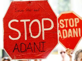 Protesters ‘locked to equipment’ at Adani mine