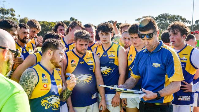 Eagles coach Matt Switala addresses his players at quarter time. Picture: Brenton Edwards