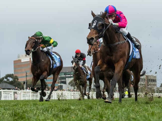 MELBOURNE, AUSTRALIA - JULY 27: Blake Shinn riding Recommendation winning Race 7, the Race-tech Bletchingly Stakes - Betting Odds, during Melbourne Racing at Caulfield Racecourse on July 27, 2024 in Melbourne, Australia. (Photo by Vince Caligiuri/Getty Images)