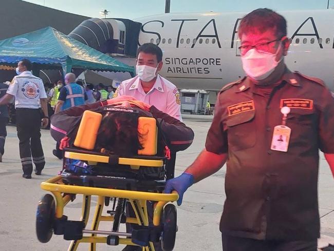 Pictured is the team who work with Chief of EMS Ruamkatanyu operation, Piyalak Kinkaew,  who was first on scene on the tarmac after the Singapore Airlines aircraft touched down in Bangkok. He treated Aussies, and had drilled for such a scenario. Picture: Jang Sawitree,