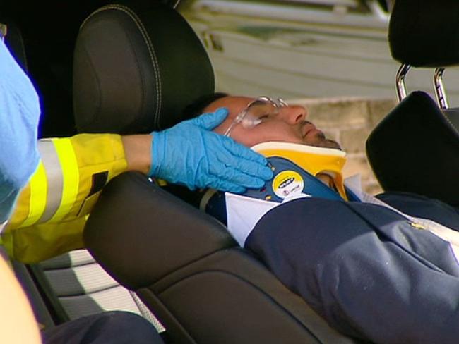 Salim Mehajer had to be put in a neck brace as paramedics worked to get him out. Picture: Rob Quee