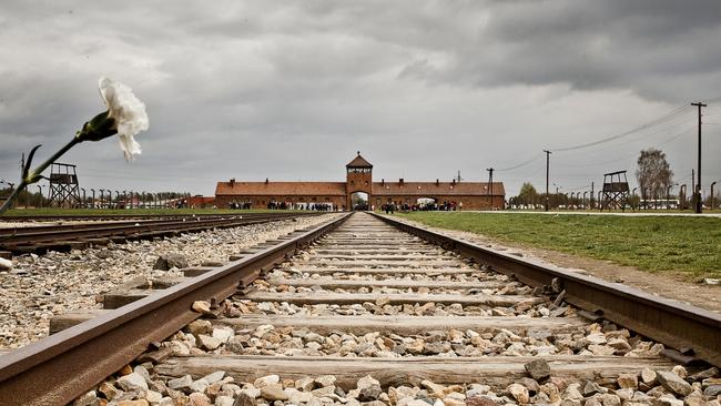 Train tracks line the entrance of Auschwitz, a former Nazi extermination camp and now a museum. Picture: iStock