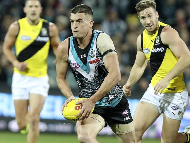 Tom Rockliff against Richmond in 2018. Picture Sarah Reed