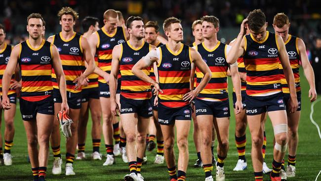 Gutted Crows players leave the field after their Collingwood horror show at Adelaide Oval. Picture: Mark Brake/Getty Images