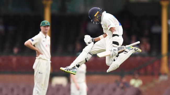 Jason Sangha celebrates his century at the SCG. Picture: AAP