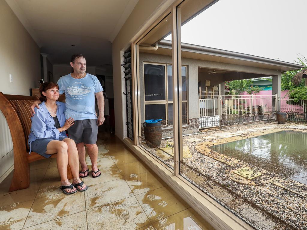 Tania and Frank Giddy of Lakeland Boulevard, Idalia, survey the damage. Picture: Michael Chambers