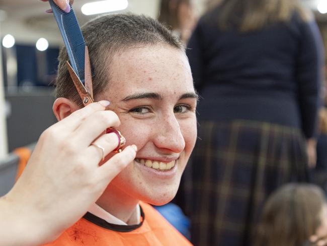 Heather McKenzie has her head shaved as the Fairholme College community raise over $95k for the Leukaemia Foundation in the World's Greatest Shave, Friday, May 24, 2024. Picture: Kevin Farmer