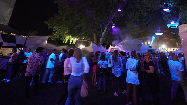 Revellers in the Neon Forest installation at the RCC at Adelaide University in 2019. Picture: Tony Kearney