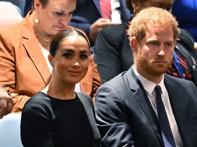 (FILES) Prince Harry (R) and Meghan Markle (L), the Duke and Duchess of Sussex, attend the 2020 UN Nelson Mandela Prize award ceremony at the United Nations in New York on July 18, 2022. A multi-million-dollar deal between a media group run by Britain's Prince Harry and his wife Meghan Markle, and streaming giant Spotify is to end, a report said June 15, 2023. (Photo by TIMOTHY A. CLARY / AFP)