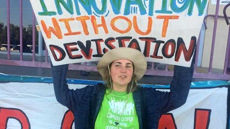 Protesters from Frontline Action on Coal disrupted Adani Australia's chief executive Lucas Dow's speech at the Industry and Innovation Forum in Emerald, Queensland on Wednesday morning. Picture: Contributed