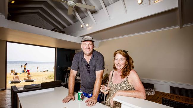 Chris and Nicole Bardoel are the former owners of a Beaumaris beach box, which was renovated to include a kitchen, dining table and tiled floors. Picture: Nicole Cleary