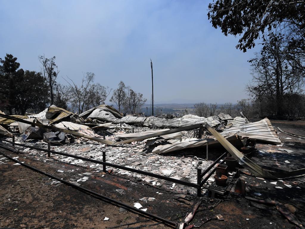 The burnt remains of a house destroyed in a bushfire in Kabra, Queensland on Thursday. Picture: Dan Peled/AAP