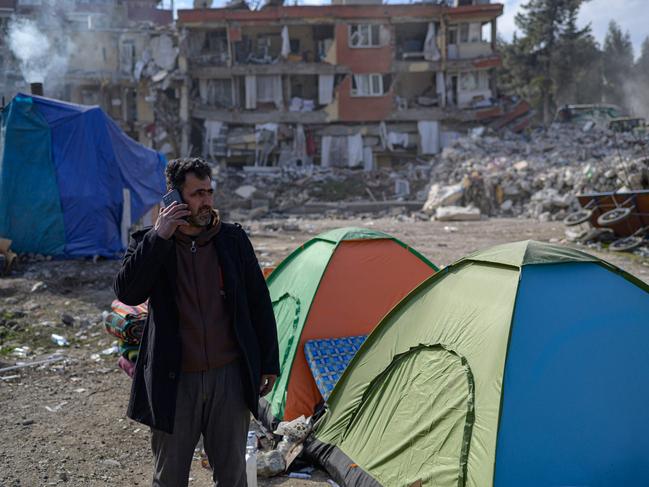 Turkish residents are living in make-shift camps as rescuers try to find survivors. Picture: AFP