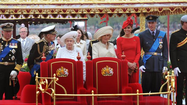 Prince Philip (2nd L) with Queen Elizabeth II (CL) and members of the royal family (L-R) Prince Charles, Camilla, Duchess of Cornwall, Catherine, Duchess of Cambridge, Prince William and Prince Harry on the royal barge 'Spirit of Chartwell' during the Thames Diamond Jubilee Pageant on the River Thames in 2012. Picture: AFP.