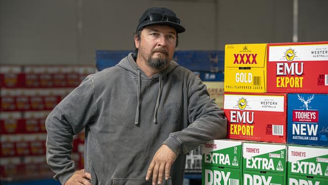 Al's Bottlemart owner Nathan Condo has over 20 pallets of stock that needs to be returned to the supplier at his expense. Picture: Jon Gellweiler/news.com.au