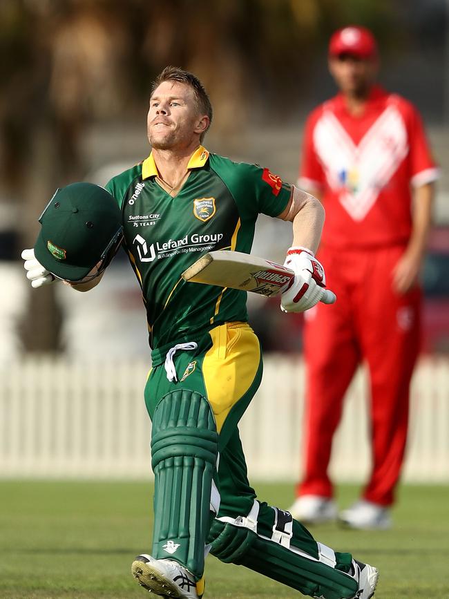 David Warner performed his now customary leap on reaching his century. (Photo by Ryan Pierse/Getty Images)