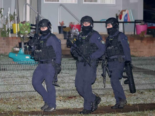 MAY 13, 2023: Riot police pictured on Goroka Street in Whalan during a police operation.Picture: Damian Shaw