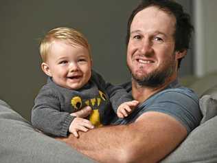 IN GOOD HANDS: Ripley plumber Clint Scott, with son Leo, will celebrate his first Father's Day tomorrow. Picture: Cordell Richardson