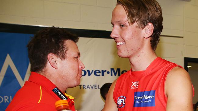 Suns head coach Stuart Dew celebrates the round 3 win over the Bulldogs. Picture: Michael Dodge/Getty Images