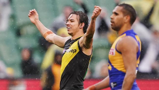 Daniel Rioli of the Tigers celebrates the win on the final siren during the Round 22 AFL match between the Richmond Tigers and the West Coast Eagles at the MCG in Melbourne, Sunday, August 18, 2019. (AAP Image/Michael Dodge) NO ARCHIVING, EDITORIAL USE ONLY