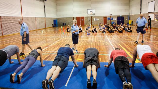 Planking, push-ups, sprints, grip tests — wannabe recruits are put through their paces. Picture: Tim Pascoe