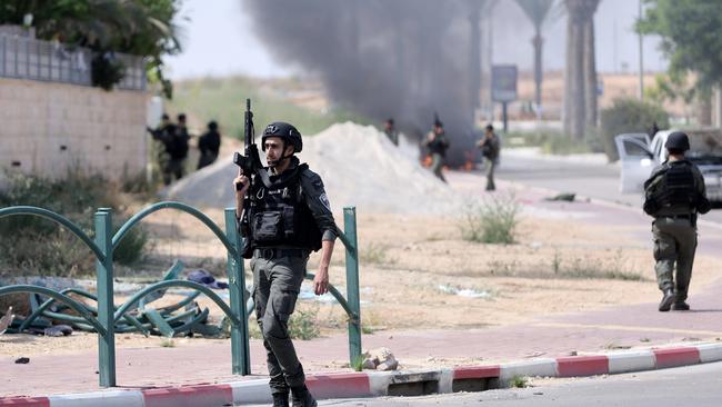 Israeli soldiers at the southern Israeli town of Ofakim on October 8. Picture: Chine Nouvelle/SIPA/Shutterstock