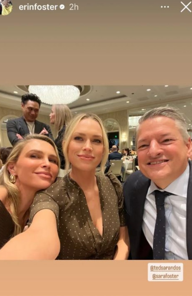 Netflix boss Sarandos instead sat with Erin Foster (centre), the creator of Netflix’s hit series Nobody Wants This, and her sister Sara Foster.