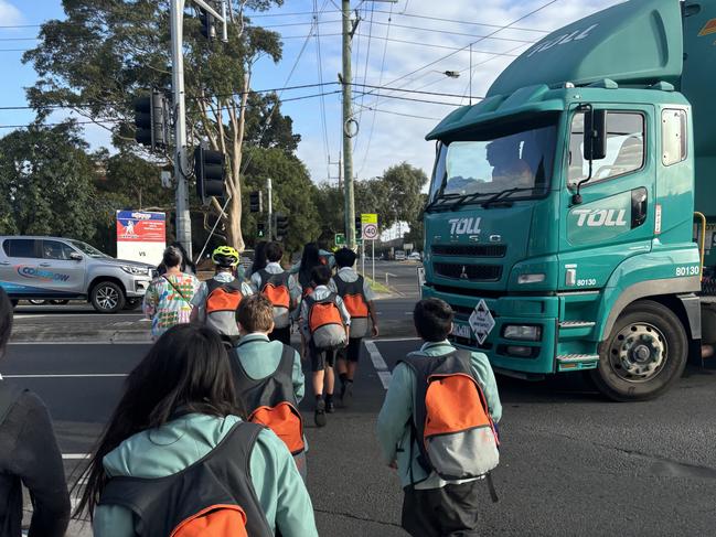 Parents say there have been several near-misses with trucks outside Port Melbourne Secondary College.