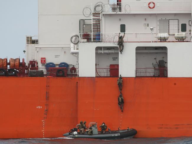 Royal Australian Navy sailors conduct a boarding operation on a UK-flagged chemical tanker. Similar boardings would be used to enforce any blockade against North Korea.