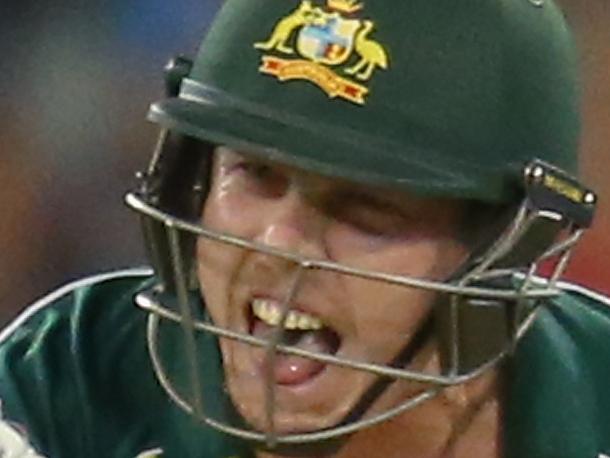 MELBOURNE, AUSTRALIA - JANUARY 18: James Faulkner of Australia celebrates as he hits the winning runs during the One Day International match between Australia and India at the Melbourne Cricket Ground on January 18, 2015 in Melbourne, Australia. (Photo by Scott Barbour/Getty Images)